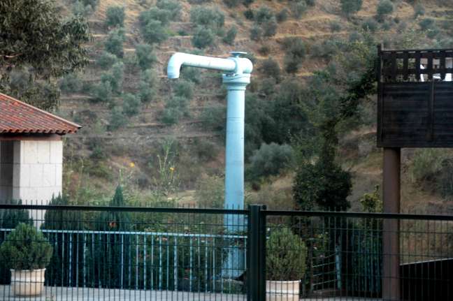 Water service from steam age at a station near Regua, Portugal