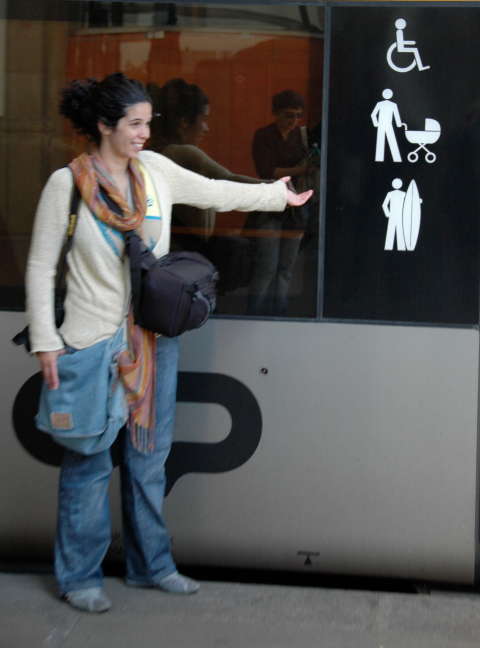 Symbols for people with carriages, wheelchairs, and. . . skateboards (!)  Central Station, Porto, Portugal