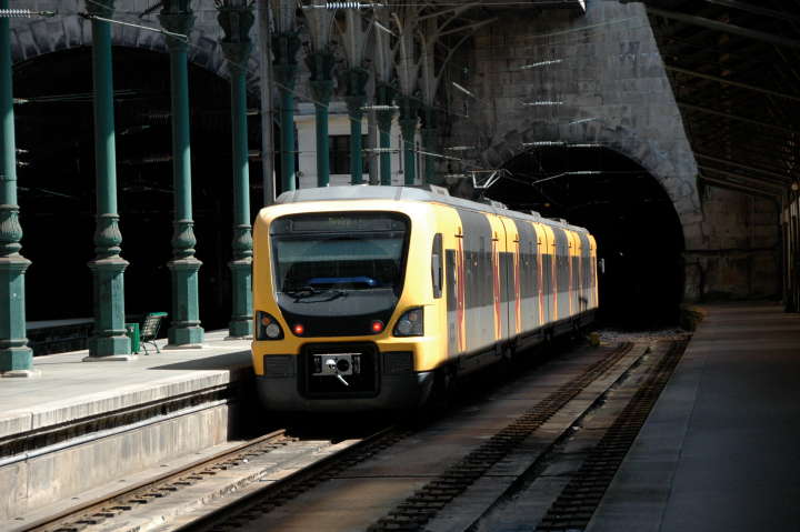 Train to Aveiro pulling out of Central Station, Porto, Portugal