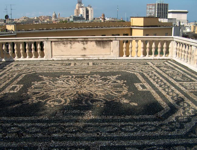 Black-and-white stone walkway in the southern garden overlooking the city