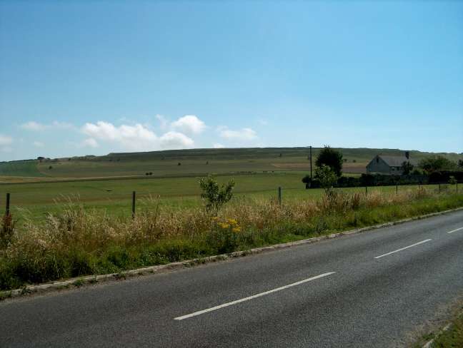 Distant view of Mai Dun Hill Fort [Maiden Castle], Dorset